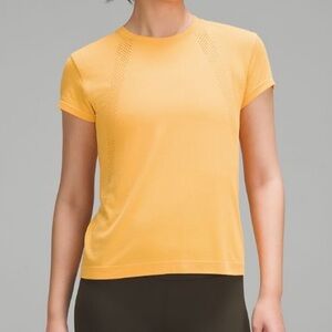 Lululemon Train to Be Short-Sleeve Shirt in color Mango Dream Women’s size 6